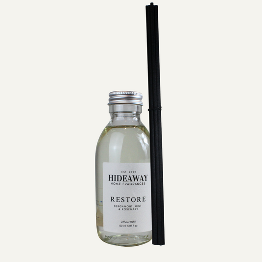 Restore Reed Diffuser Refill with bergamot, mint, rosemary, and woody undertones – refreshing, energising, and balanced scent – Hideaway Home Fragrances