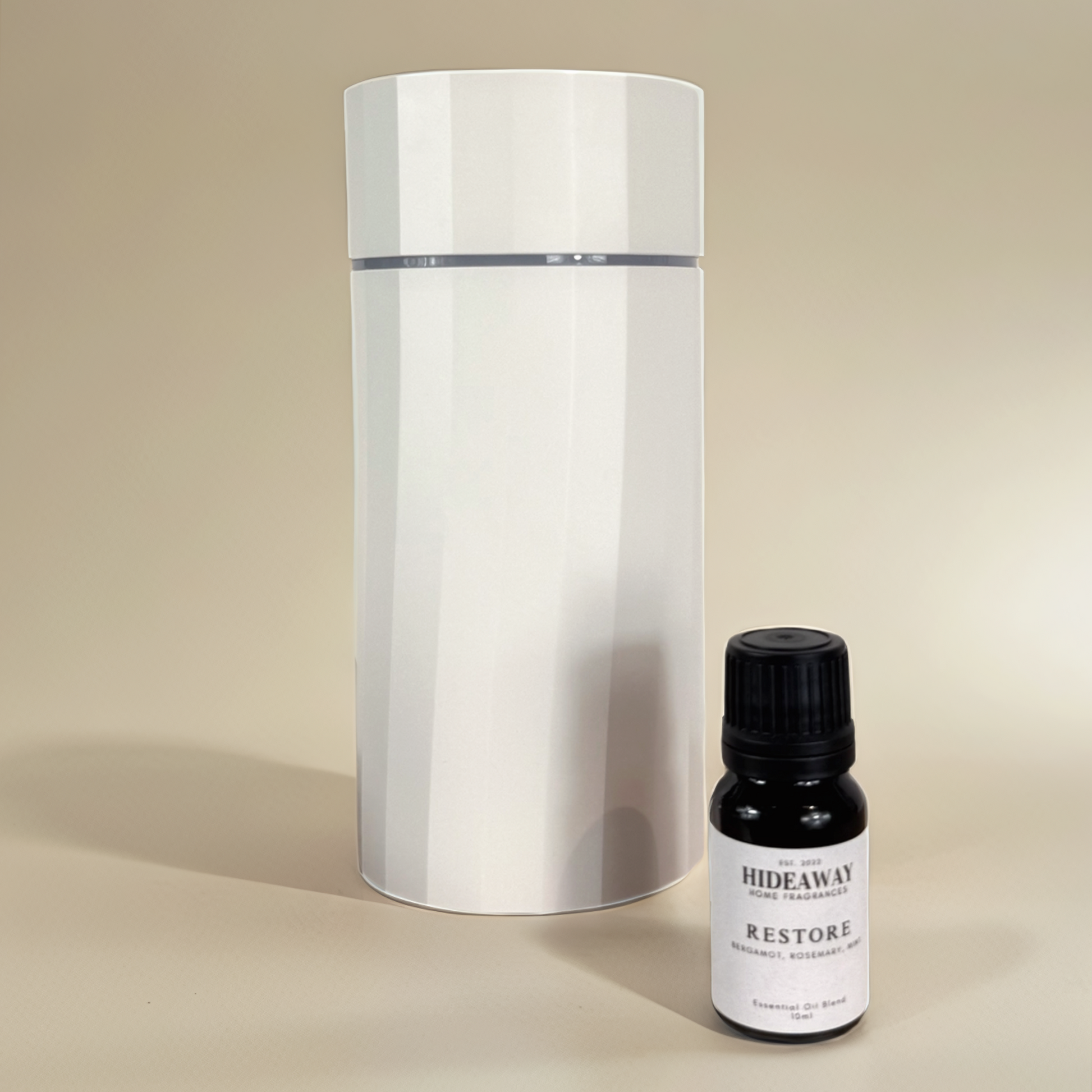 Crisp bergamot and mint blend with herbal rosemary and woody undertones to create a refreshing, balanced scent — Hideaway Home Fragrances