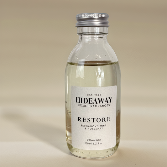 Restore Reed Diffuser Refill with bergamot, mint, rosemary, and woody undertones – refreshing, energising, and balanced scent – Hideaway Home Fragrances