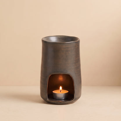 Hideaway Home Fragrances Rustic Ceramic Burner styled on a wooden tabletop in a cosy, warm-toned country home setting