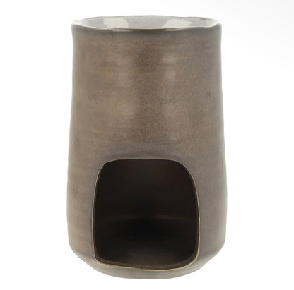 Cosy warm glow from the Rustic Ceramic Burner by Hideaway Home Fragrances melting wax melts with a lit tealight
