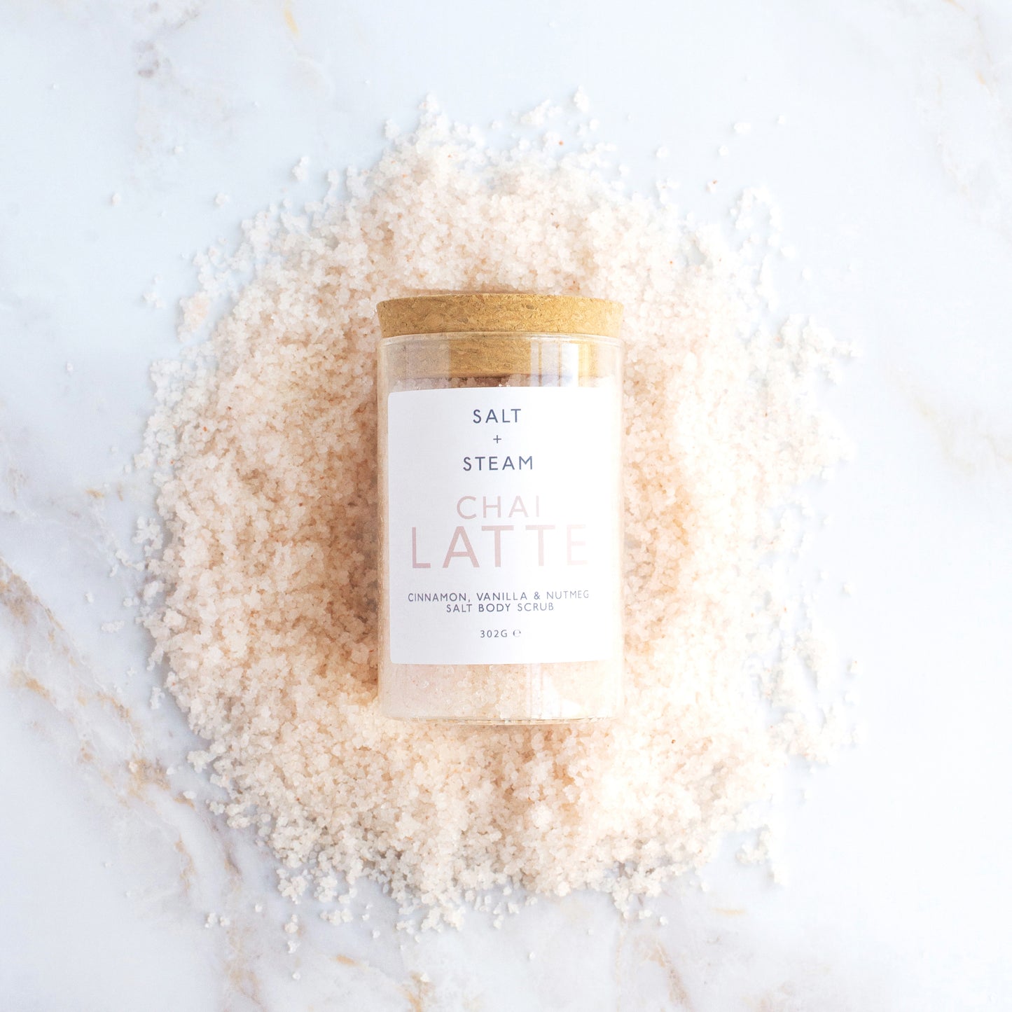 Warm and nourishing Chai Latte Body Scrub, infused with cinnamon, vanilla, and nutmeg for a cosy scent - Hideaway Home Fragrances