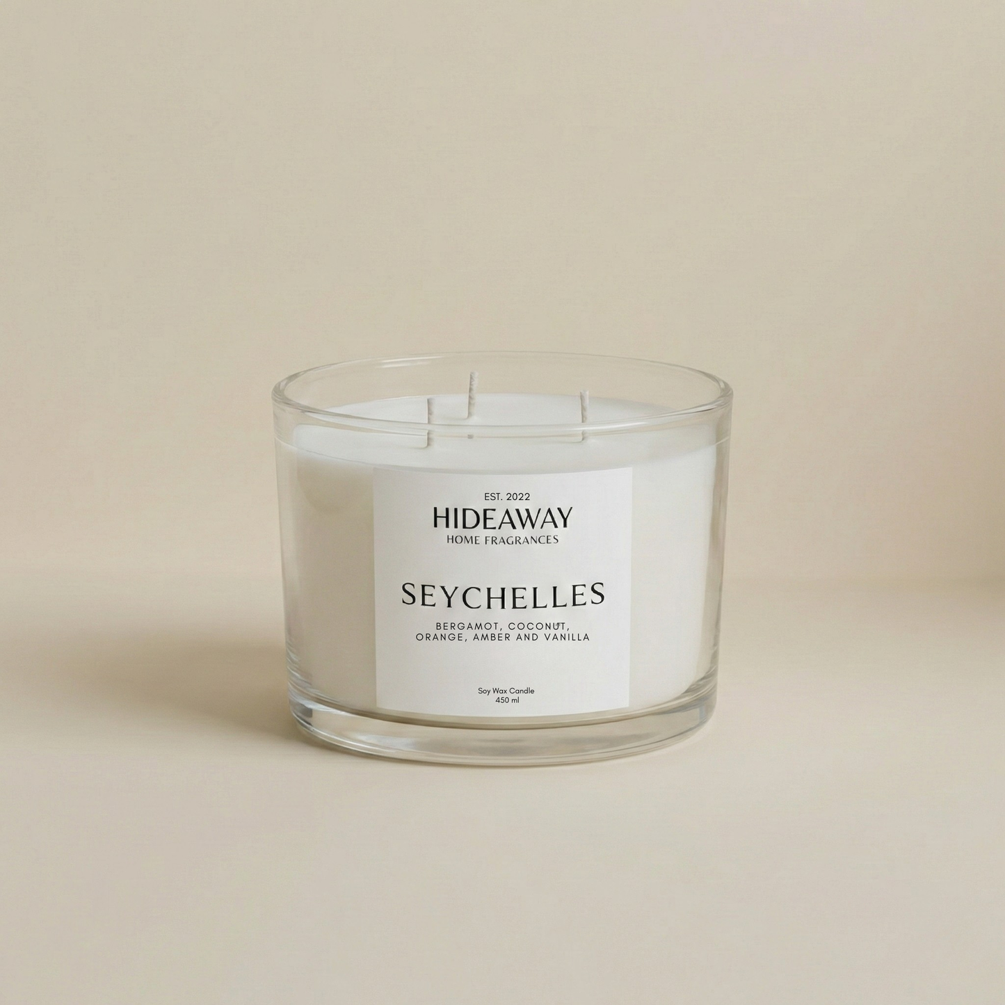 Seychelles 3-wick luxury candle with citrus and tropical notes creating a sun-drenched, relaxing home atmosphere