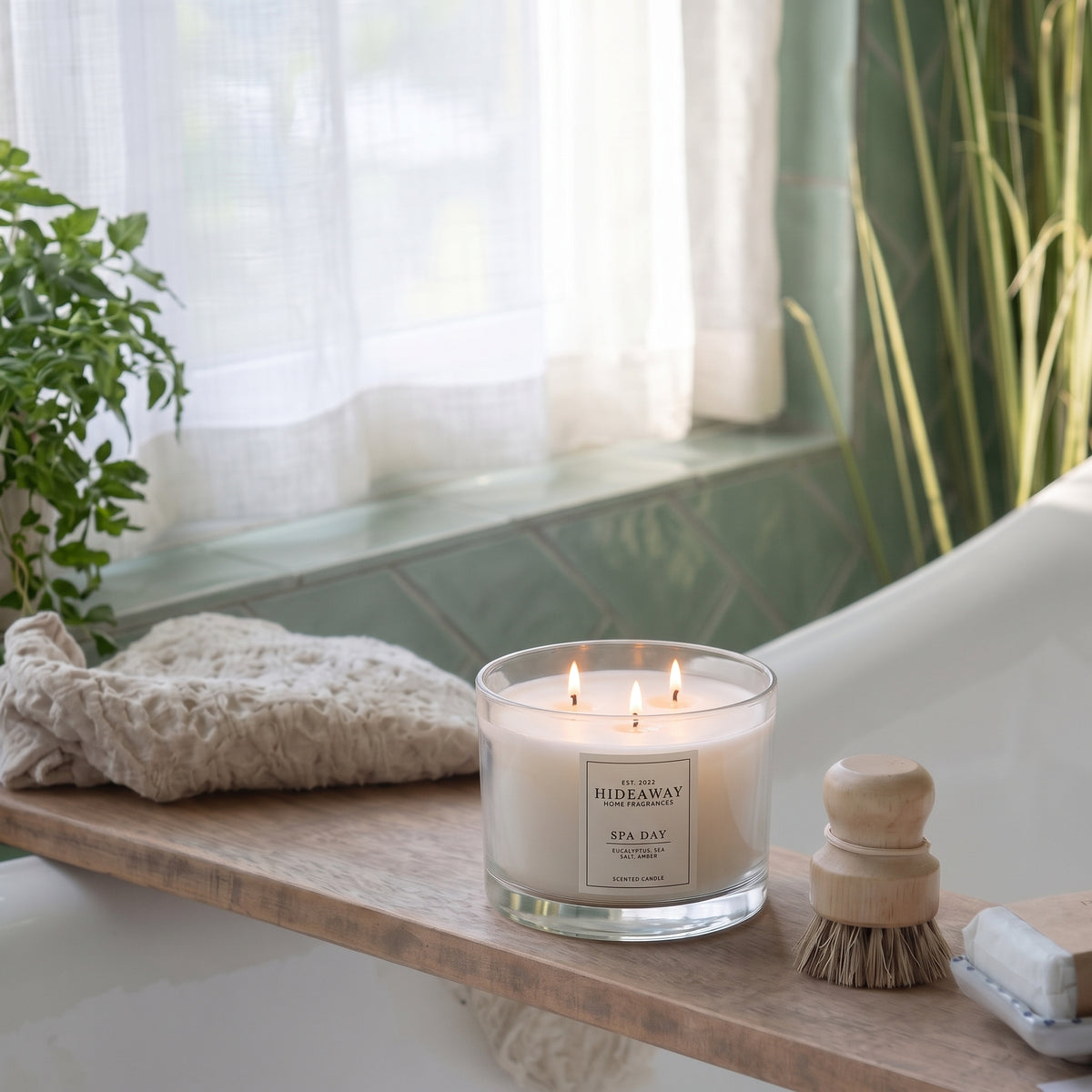 Spa Day 3-wick luxury candle with sea salt, eucalyptus and floral notes creating a calming, serene home atmosphere