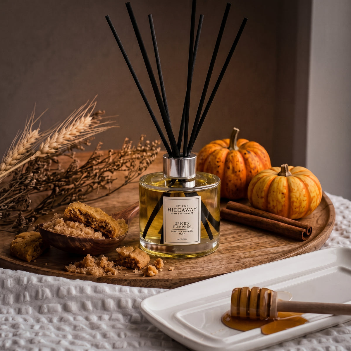 Spiced pumpkin reed diffuser by Hideaway Home Fragrances featuring rich pumpkin spice and a warm musk base
