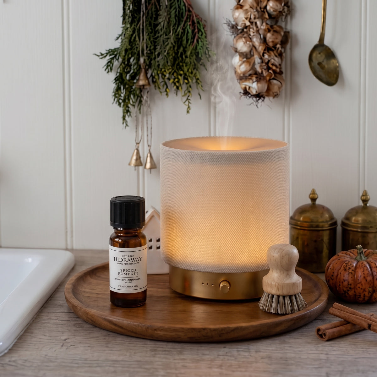 Fragrance notes breakdown for Hideaway Home Fragrances spiced pumpkin fragrance oil featuring sweet pumpkin, warm cinnamon, rich clove, and soft musk.