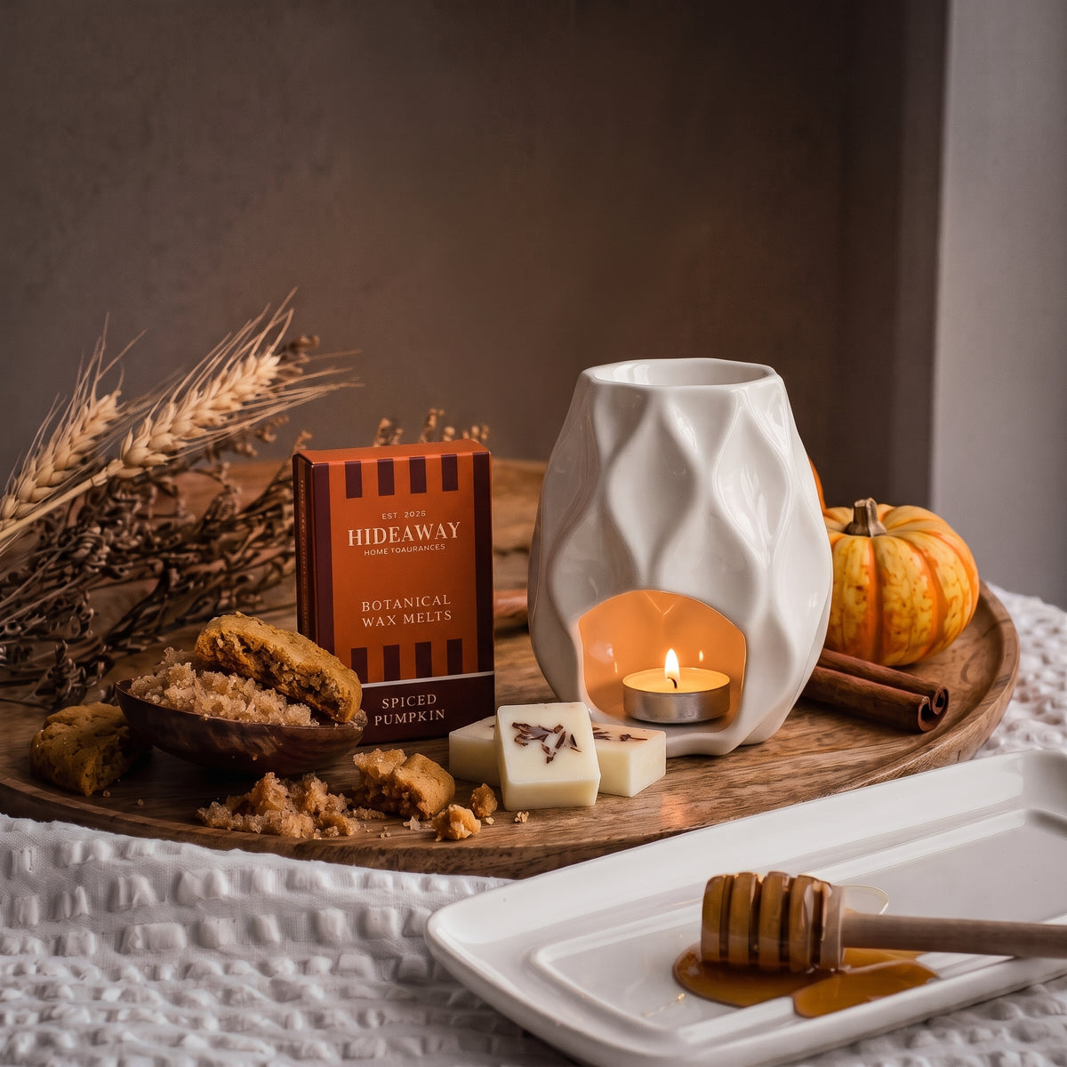 Artisan spiced pumpkin botanical wax melt snap bar by Hideaway Home Fragrances topped with dried autumnal spice botanicals