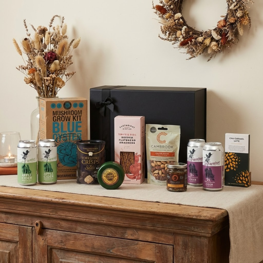The Crafted Heritage luxury hamper featuring Two Farmers Apple and Berry Ciders, Mouse House cheese truckle, and Mushroom Grow Kit.