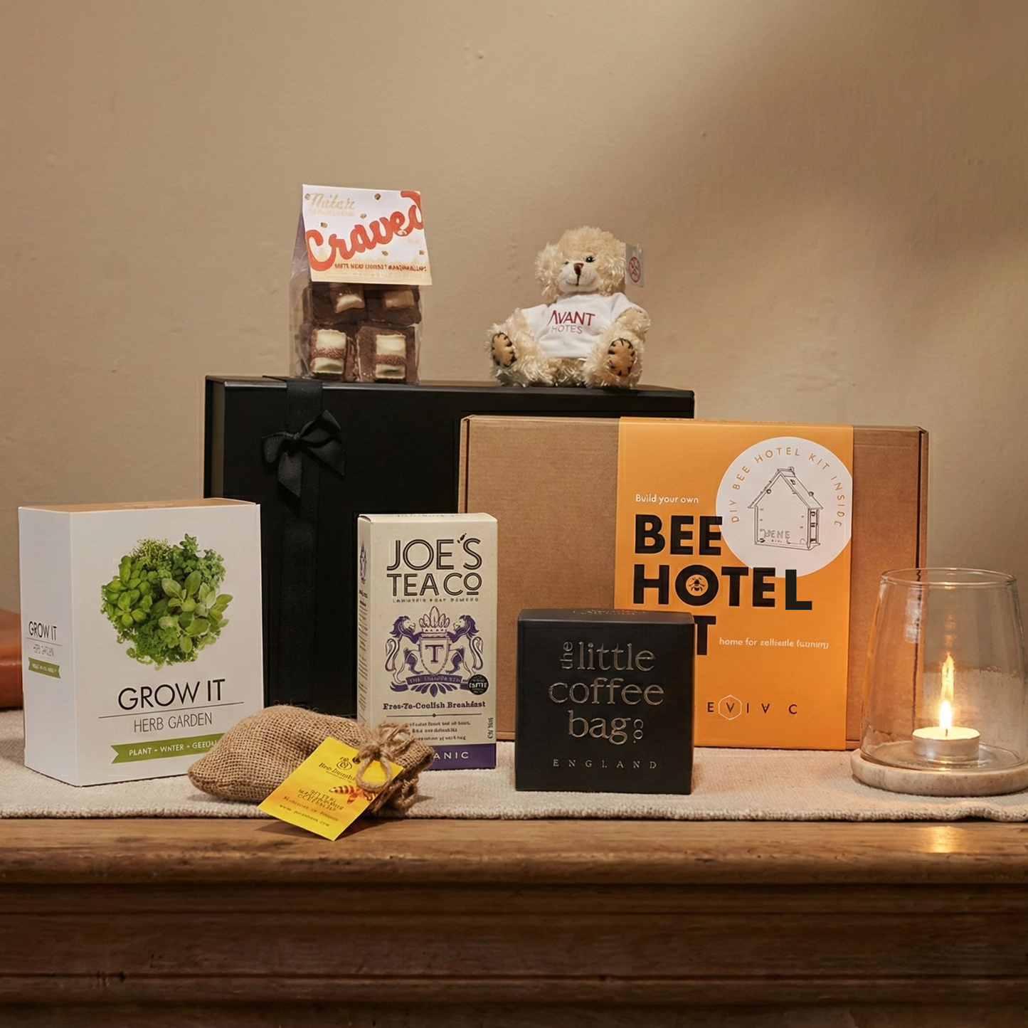 The Gardners Curated Gift Hamper featuring DIY Bee Hotel kit, Native Wildflower Beebombs, and plush teddy bear.