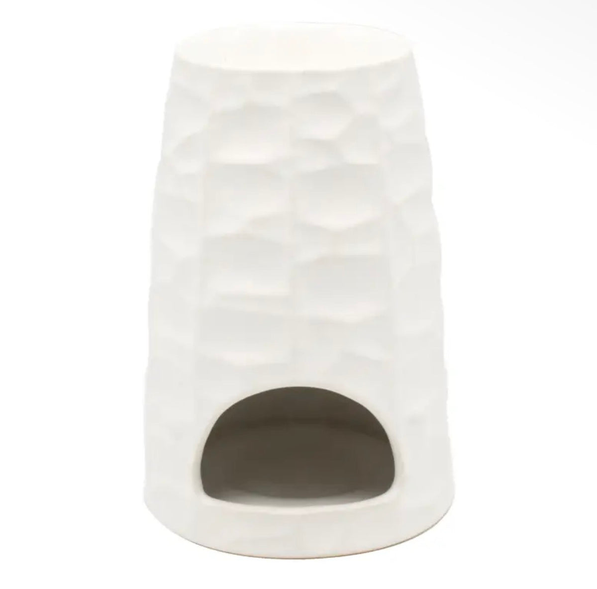 Detailed tactile finish and soft domed curves of The Hive ceramic wax melt burner from Hideaway Home Fragrances