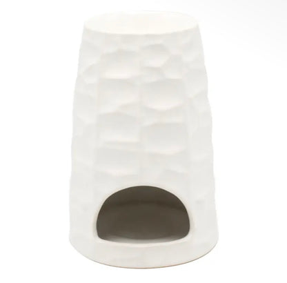 Detailed tactile finish and soft domed curves of The Hive ceramic wax melt burner from Hideaway Home Fragrances