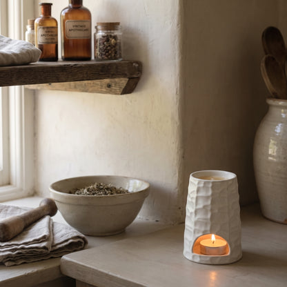 Hideaway Home Fragrances ceramic wax melt burner The Hive styled in a cosy modern living room setting