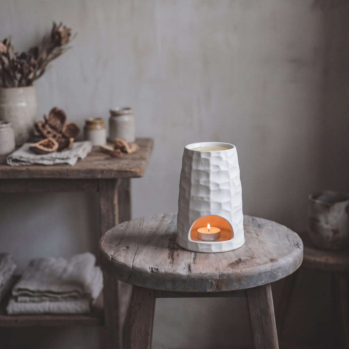 The Hive minimalist ceramic wax melt burner in cream with curved dome silhouette by Hideaway Home Fragrances