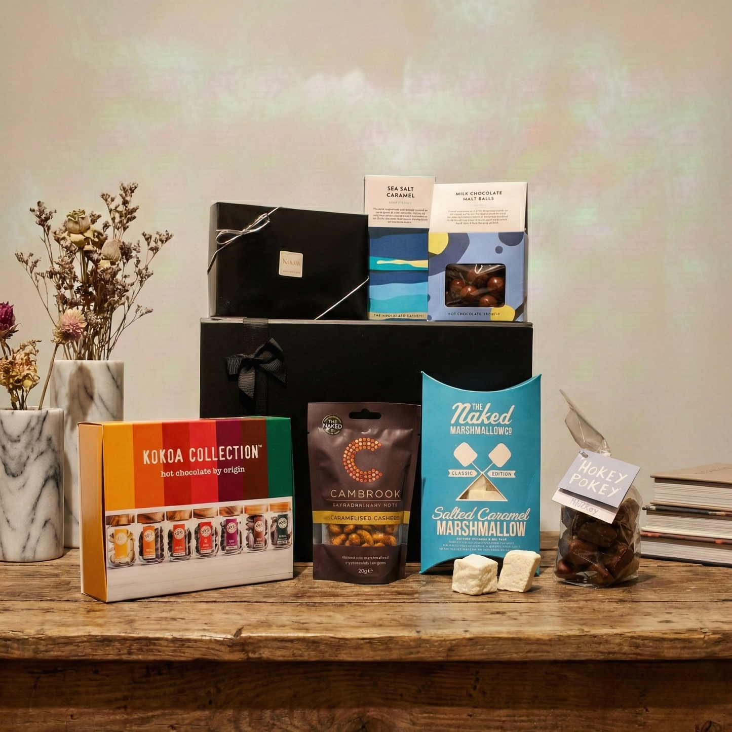The Manor House Gift Box Collection featuring Kokoa Hot Chocolate, The Chocolate Society honeycomb, and Naked Marshmallows.