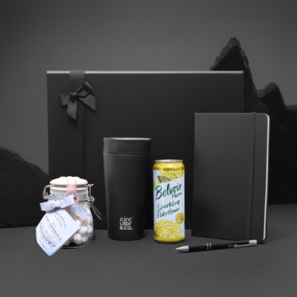 Script & Savor Gift Box featuring A5 notebook, recycled steel travel mug, and Cartwright & Butler sweet jar.