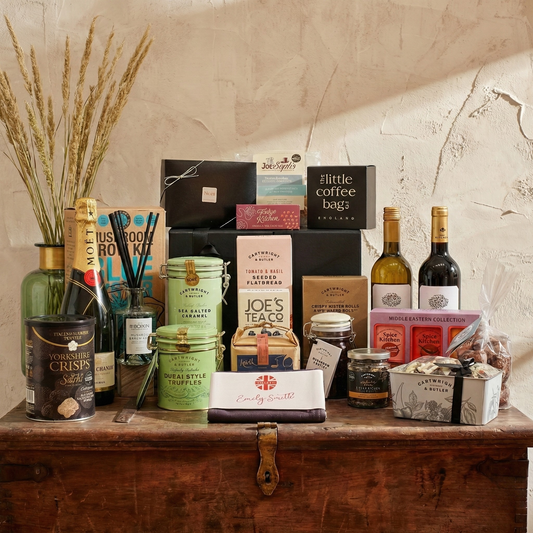 The Grand Larder luxury gift hamper featuring Moët & Chandon Champagne, Finca Manzanos wines, and a massive selection of gourmet food.