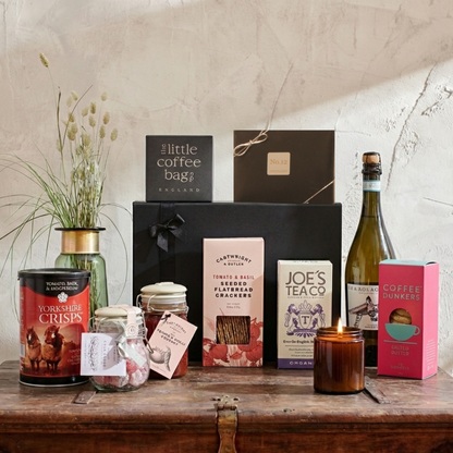 The Heritage Reserve Gift Hamper featuring Sea Change Prosecco, Cartwright & Butler Kiln Jar, and Hideaway glass candle.