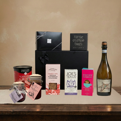The Old Mill Gift Box Collection featuring Sea Change Prosecco, Cartwright & Butler Kiln Jar of sweets, and Coffee Dunkers.
