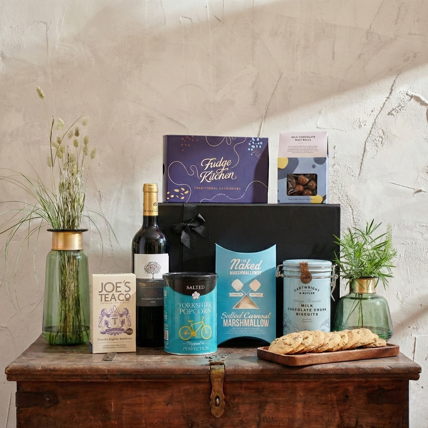 The Refined Pantry Gift Hamper featuring Finca Manzanos Rioja, Fudge Kitchen selection box, and Yorkshire Crisps popcorn.