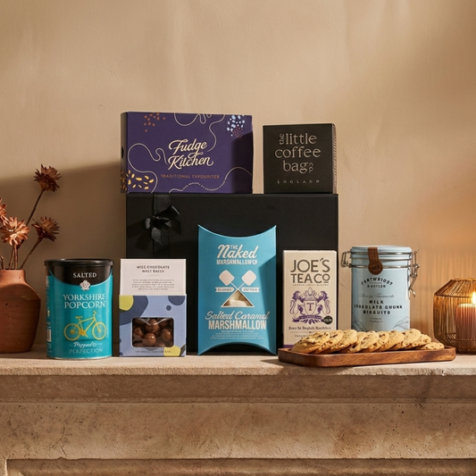 The Signature Provision Gift Hamper featuring Fudge Kitchen selection box, Cartwright & Butler biscuits, and Joe's Tea.