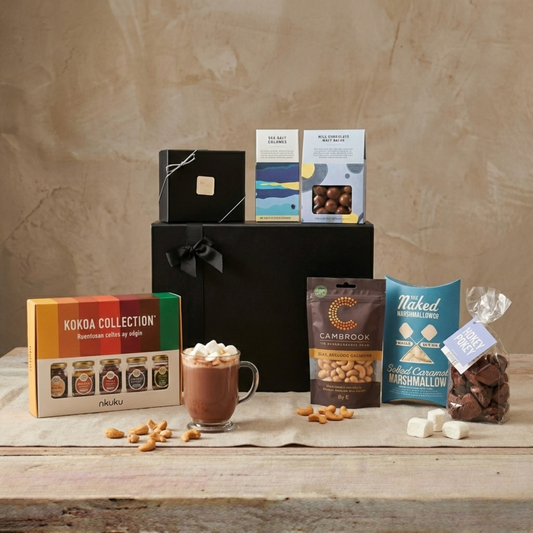 The Traditional Chocolate Pantry Gift Hamper featuring Kokoa Hot Chocolate, The Chocolate Society honeycomb, and Naked Marshmallows.