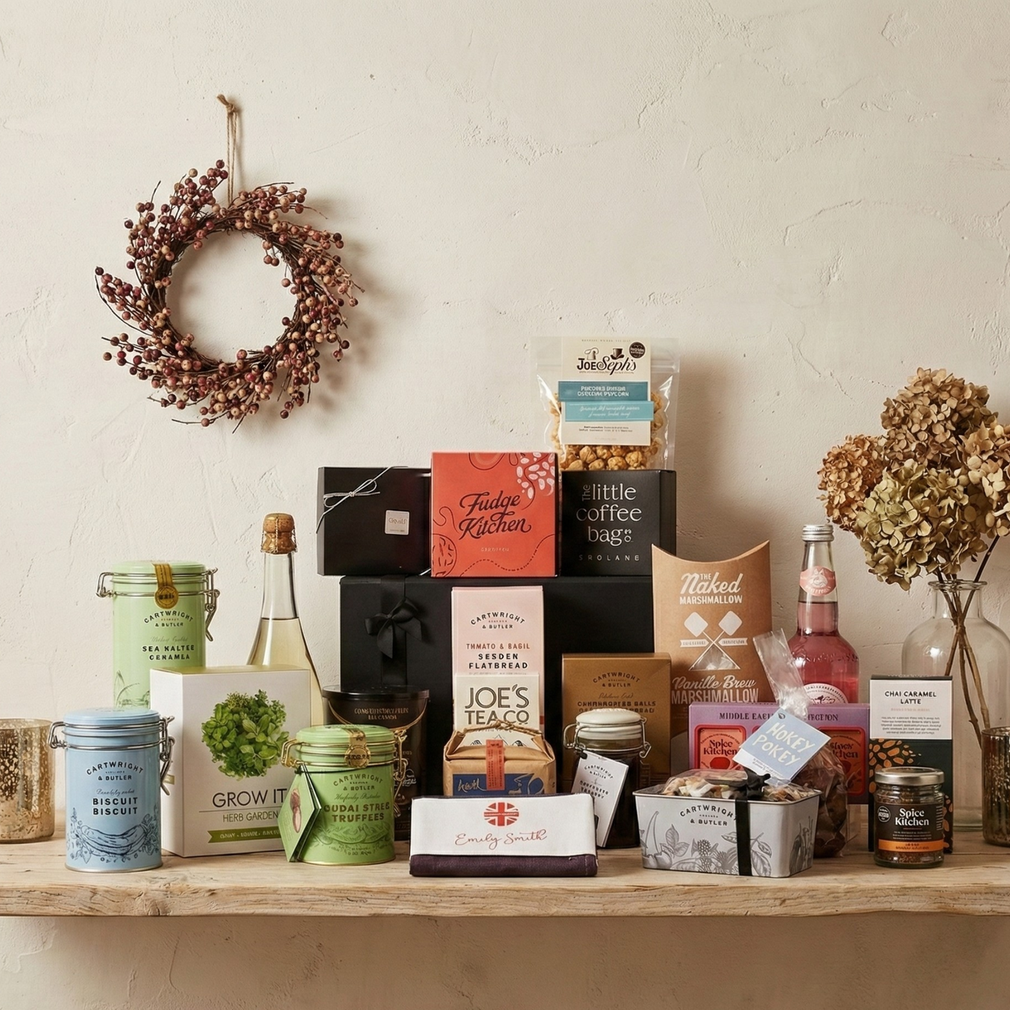  The Traditional Table Gift Hamper featuring Sea Change alcohol-free cans, Cartwright & Butler cake tin, and Spice Kitchen trio.