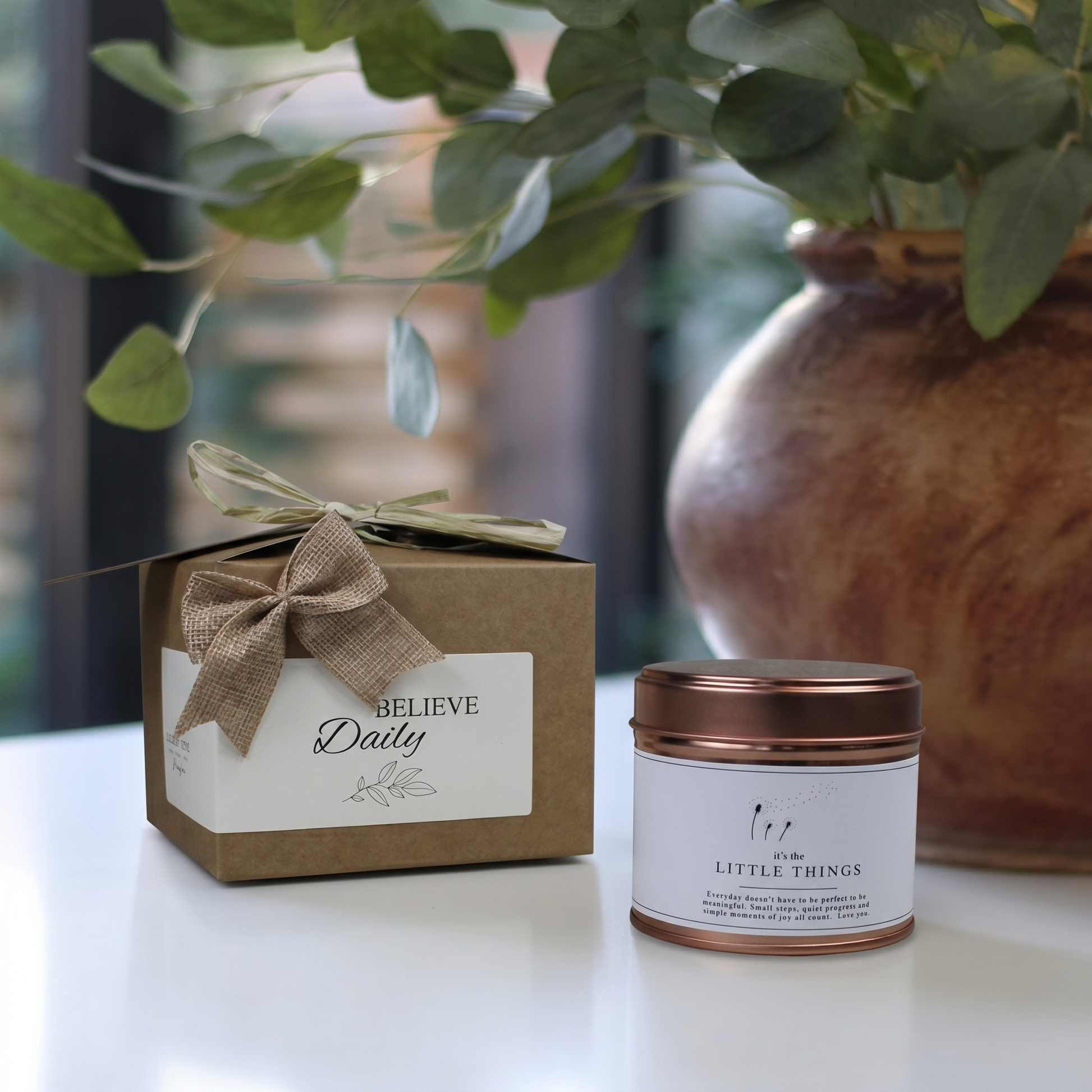 Sympathy and care package gift box featuring a custom-labeled comforting quote candle and matching home fragrance diffuser by Hideaway Home Fragrances.