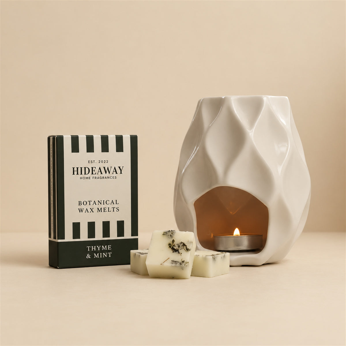Hideaway Home Fragrances thyme and mint botanical wax melts eco-friendly packaging highlighting notes of bright bergamot, cedarwood, and marjoram