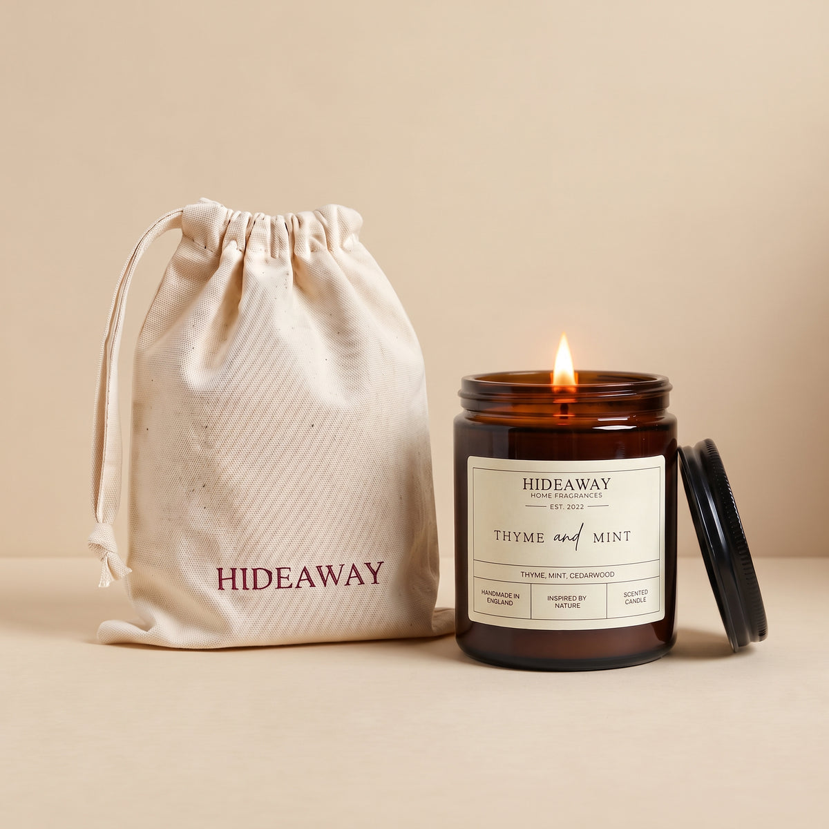 Thyme and mint amber glass candle with fresh herbal aromatic scent by Hideaway Home Fragrances