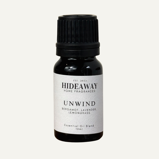 Unwind Essential Oil with refreshing lemongrass, calming bergamot, and soothing lavender for a revitalising and uplifting atmosphere — Hideaway Home Fragrances