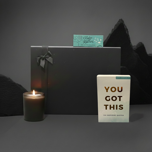 The Mindful Indulgence gift set featuring 'You Got This' quote cards, Hideaway glass candle, and Fudge Kitchen slider.