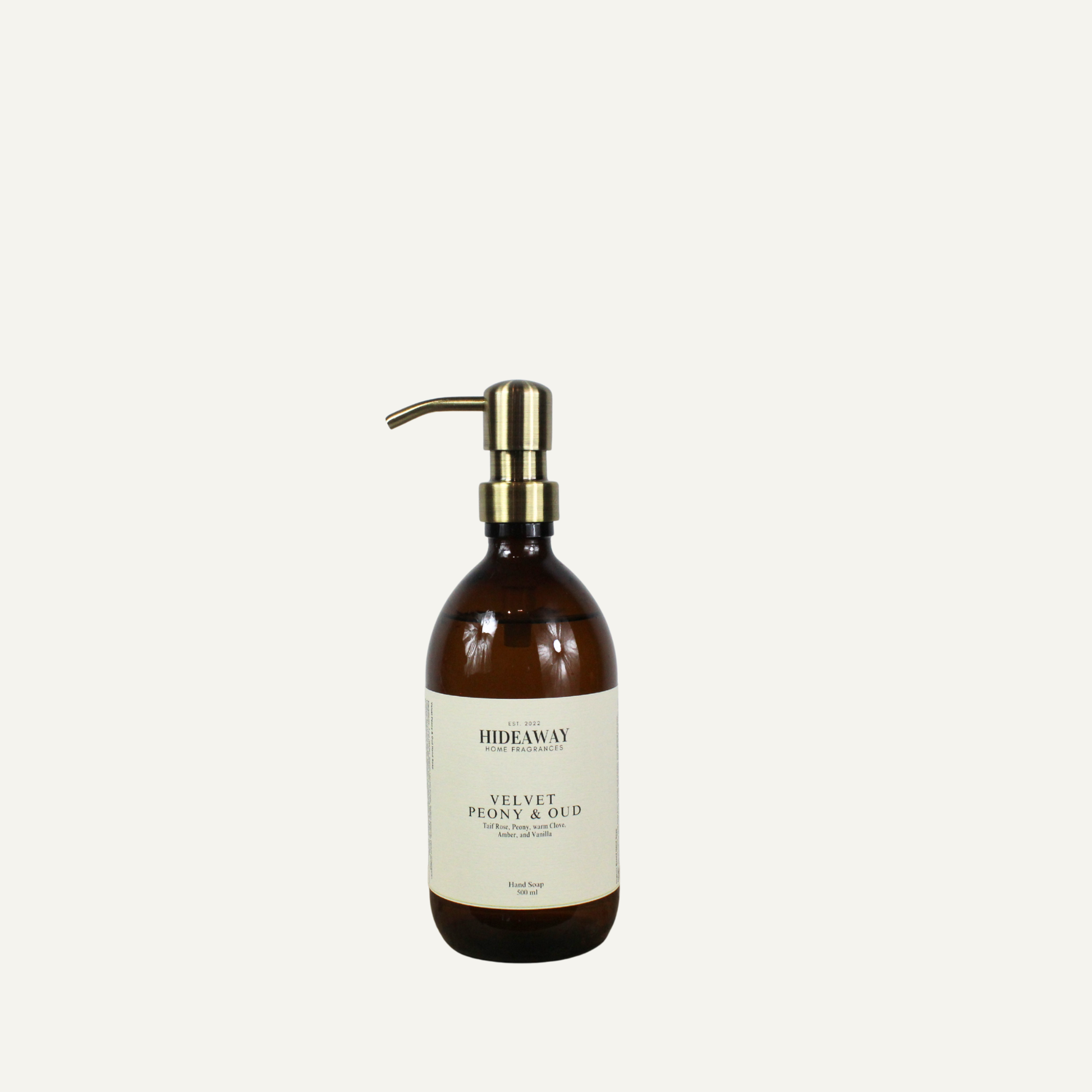 Decorative amber glass hand wash with sustainable reusable packaging