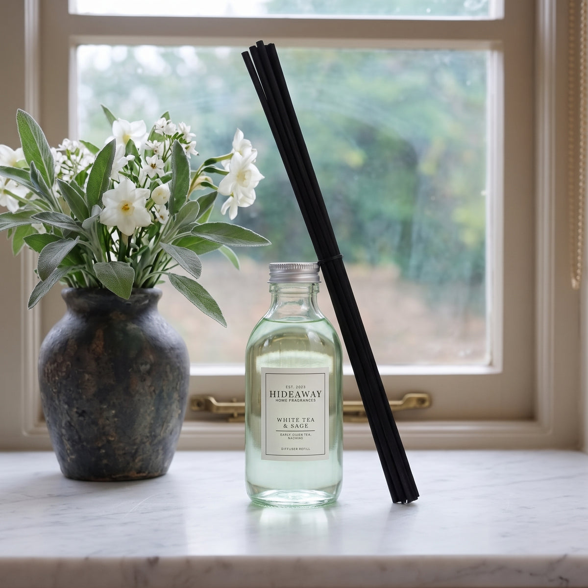 White tea and sage diffuser oil refill by Hideaway Home Fragrances with crisp mint, delicate white tea, and oolong