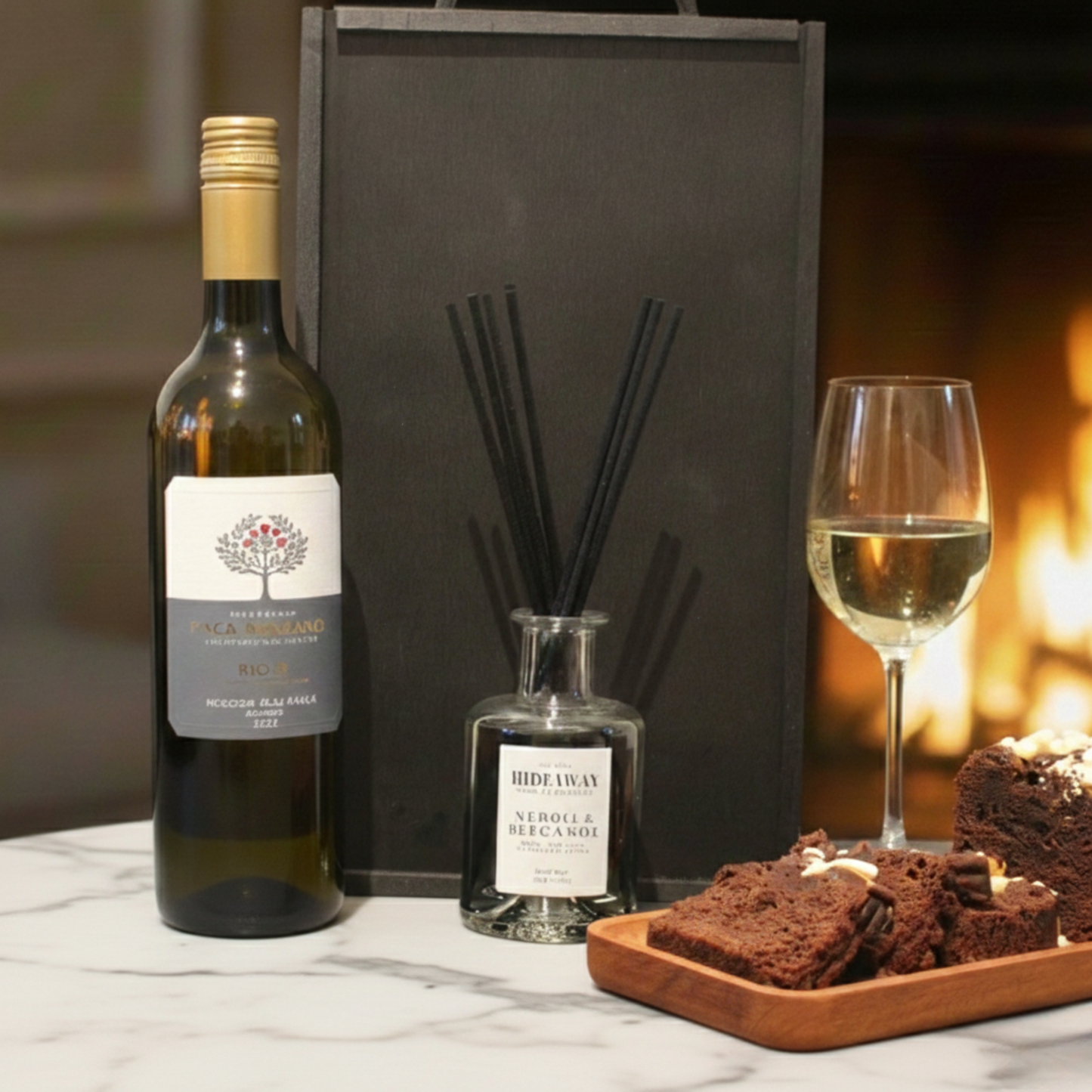 Close up of the Hideaway Reed Diffuser and Cartwright & Butler Chocolate Loaf Cake tin.