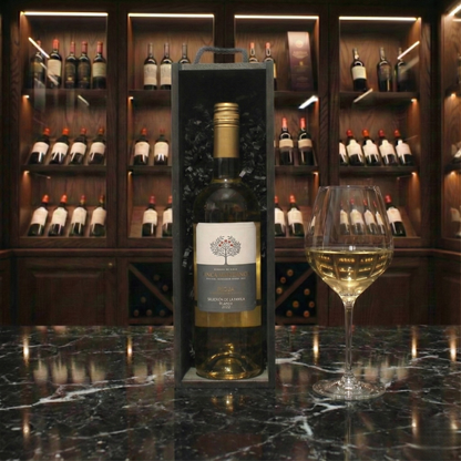 The Wine Cellar Gift Box featuring a bottle of Finca Manzanos Seleccion de la Familia Blanco  inside a sleek black wooden wine box.