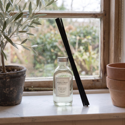 Wood sage and sea salt diffuser oil refill by Hideaway Home Fragrances featuring ambrette, ozone, and cedarwood