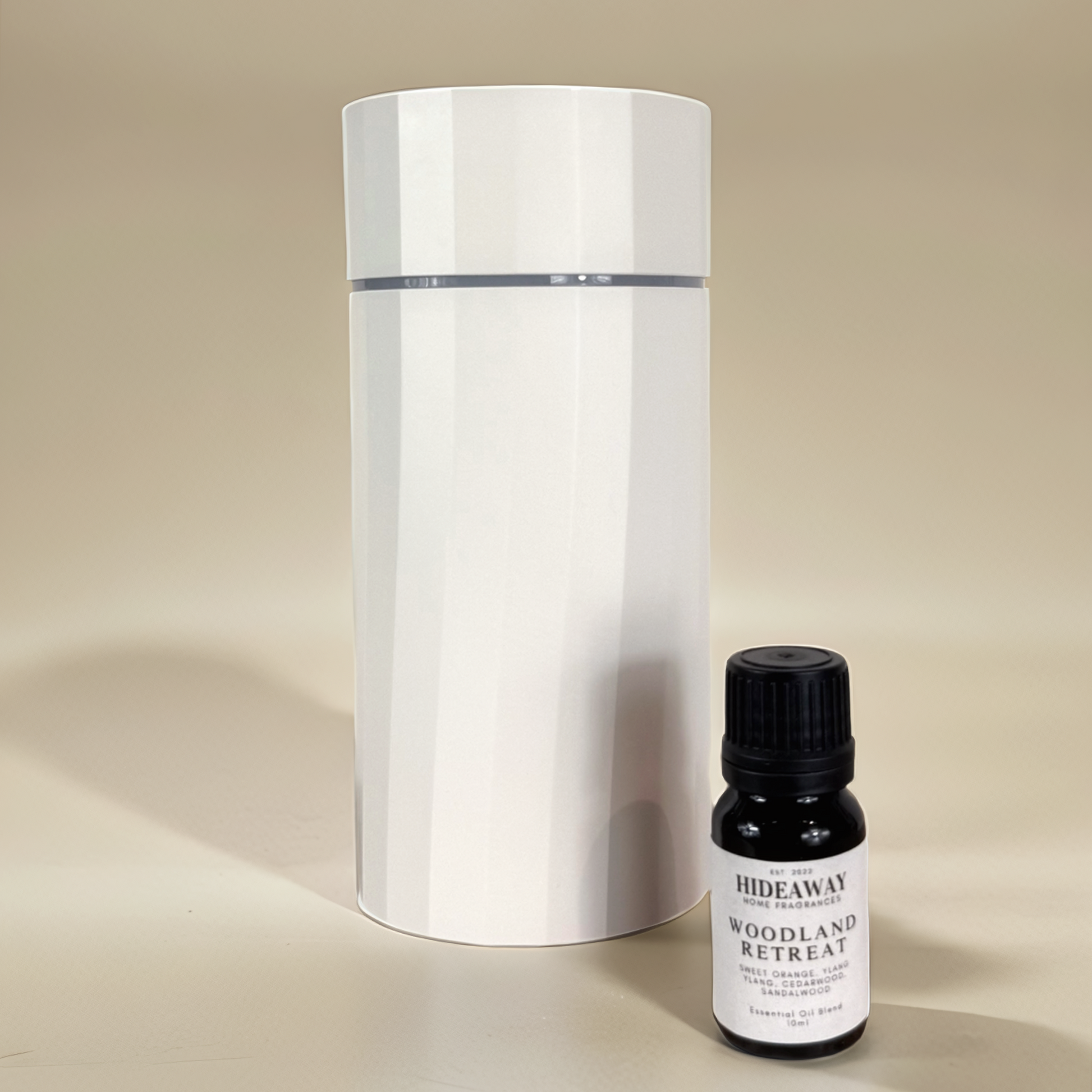Uplifting and floral essential oil blend featuring sweet orange, ylang ylang, cedarwood, and sandalwood creating a peaceful, grounding aroma — Hideaway Home Fragrances