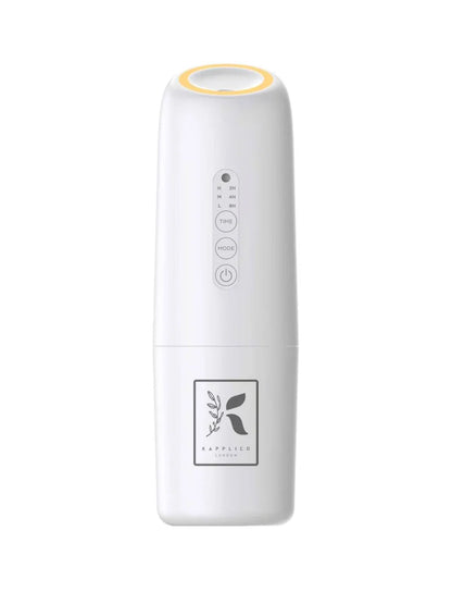 The Kapplico Waterless Plug-In Diffuser from Hideaway Home Fragrances active in a living room, quietly diffusing a fine, waterless aromatherapy mist.
