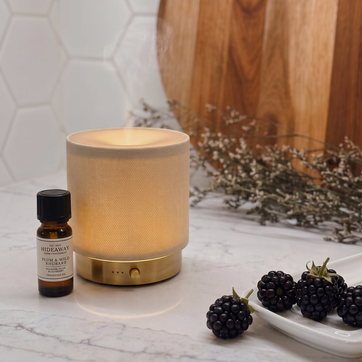 Fragrance notes breakdown for Hideaway Home Fragrances plum and wild rhubarb fragrance oil featuring tart rhubarb, juicy peach, ripe plum, and wild blackberry