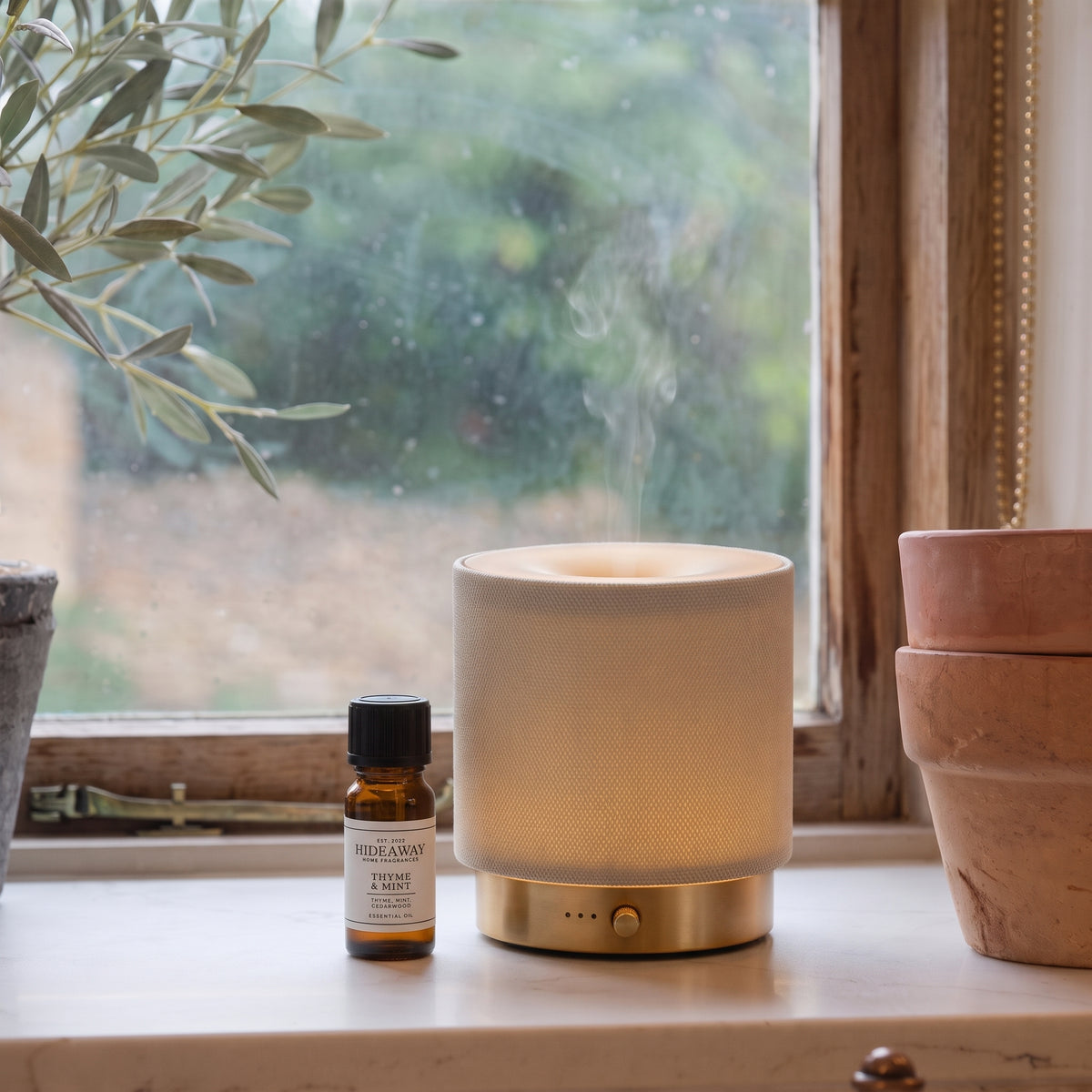 Fragrance notes breakdown for Hideaway Home Fragrances thyme and mint fragrance oil featuring invigorating peppermint, red thyme, fresh tea tree, and petitgrain.